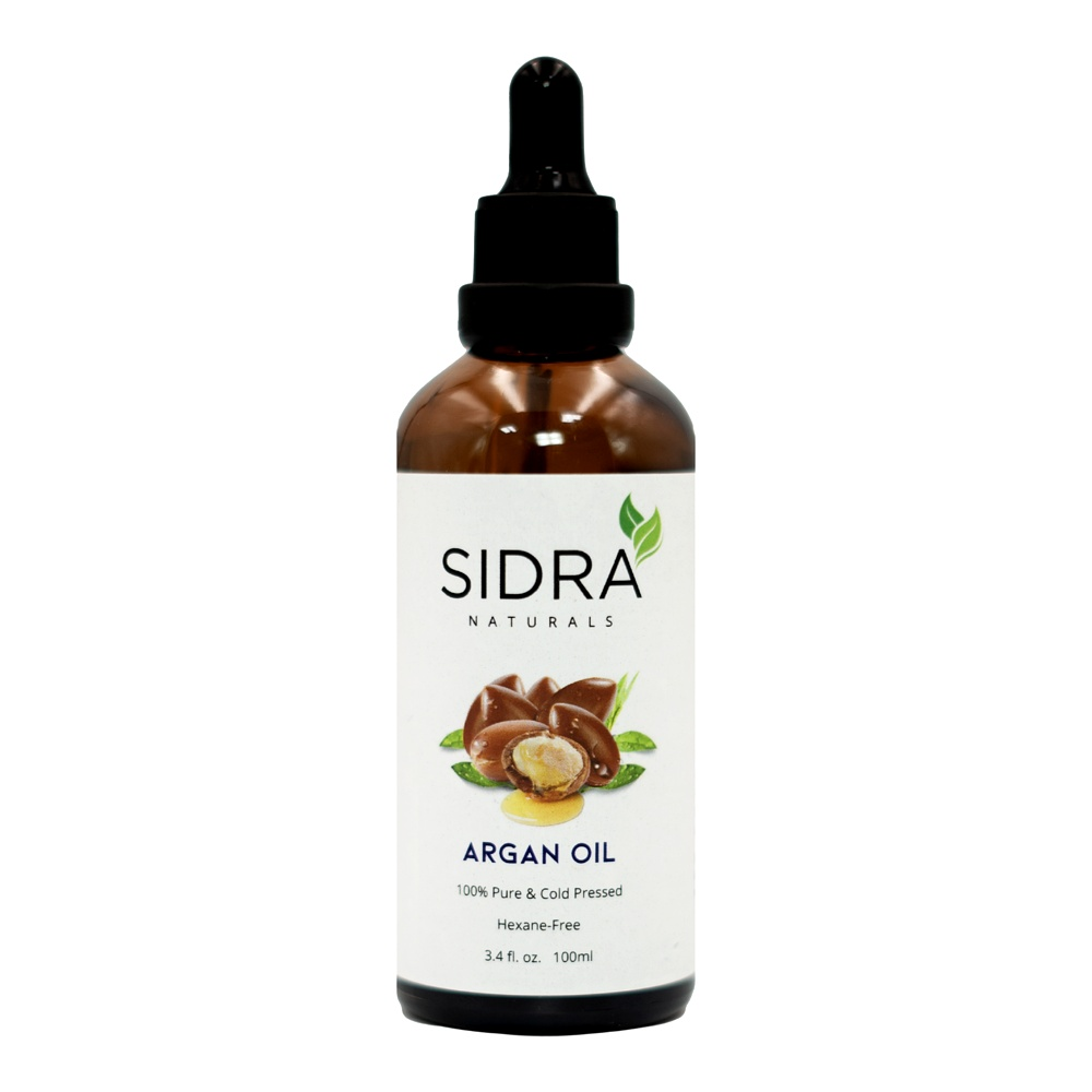 SIDRA Naturals 100% Pure Argan Oil – Cold-Pressed & Hexane-Free in amber glass dropper bottle | زيت الأركان النقي من سيدرا ناتشورالز – معصور على البارد وخالٍ من الهكسان في زجاجة قطارة داكنة
