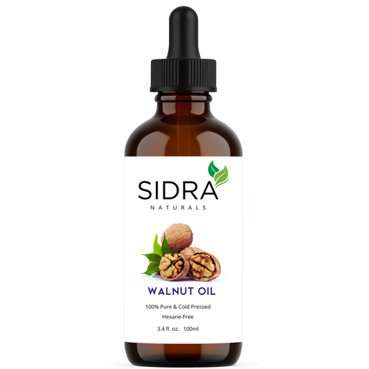 Sidra Naturals 100% Pure Walnut Oil in amber glass bottle with white label and black dropper – cold-pressed and hexane-free.

زيت الجوز النقي 100% من Sidra Naturals بزجاجة بنية وملصق أبيض وقطارة سوداء – معصور على البارد وخالٍ من الهكسان.